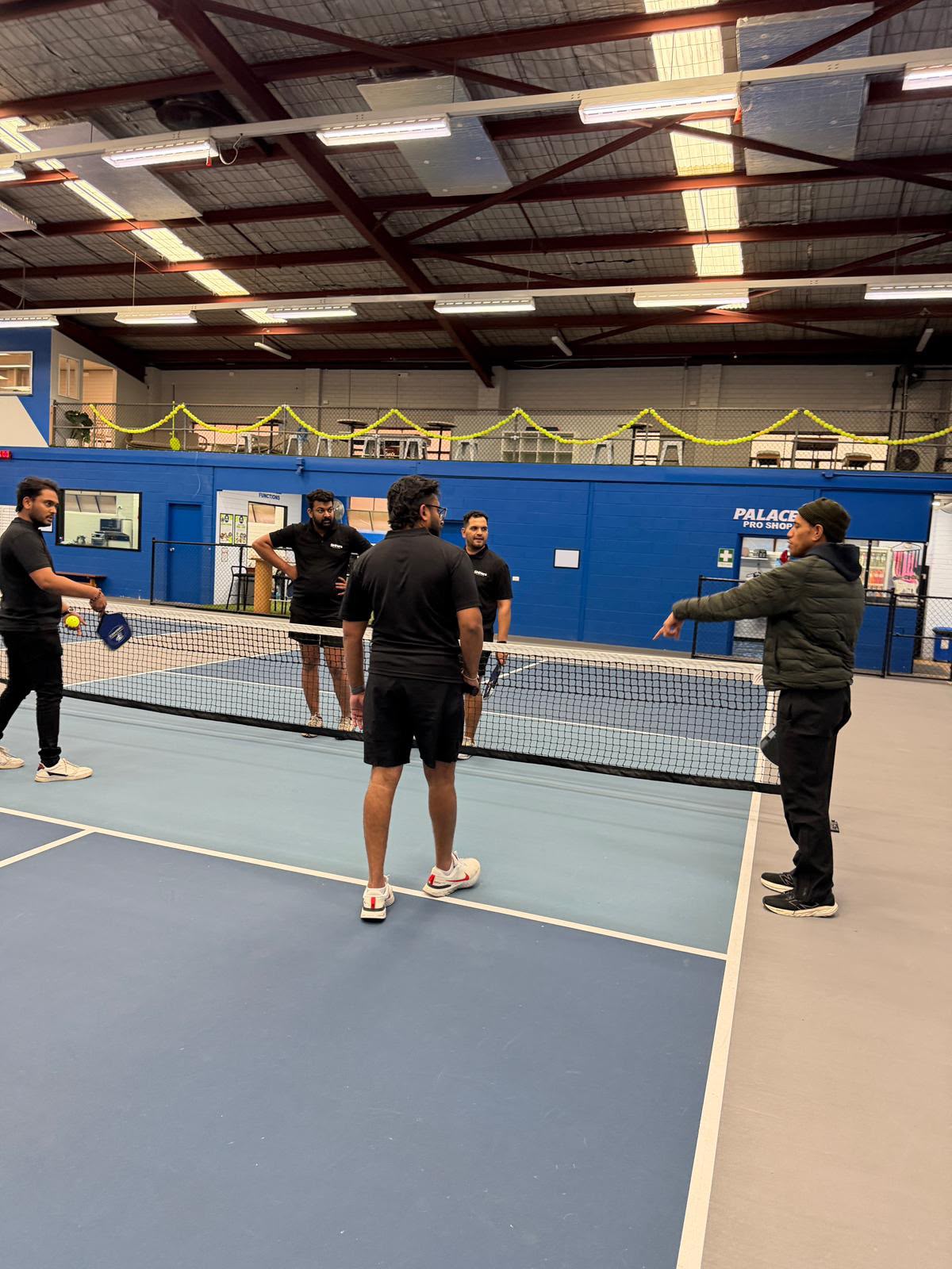 Team Shiners practicing on the pickleball court